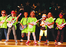 Cathy Lankenau's first-grade class performs "Summarize a Story" May 7 in Southside Elementary School's variety show.