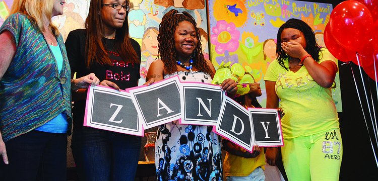 Dr. Myra McPherson, 2012 Girl of the Year Shayla Brown, Shakeyla Dozier, Shaiya Dozier and Zandy Sanders Jan. 11 during the surprise reception for Zandy.
