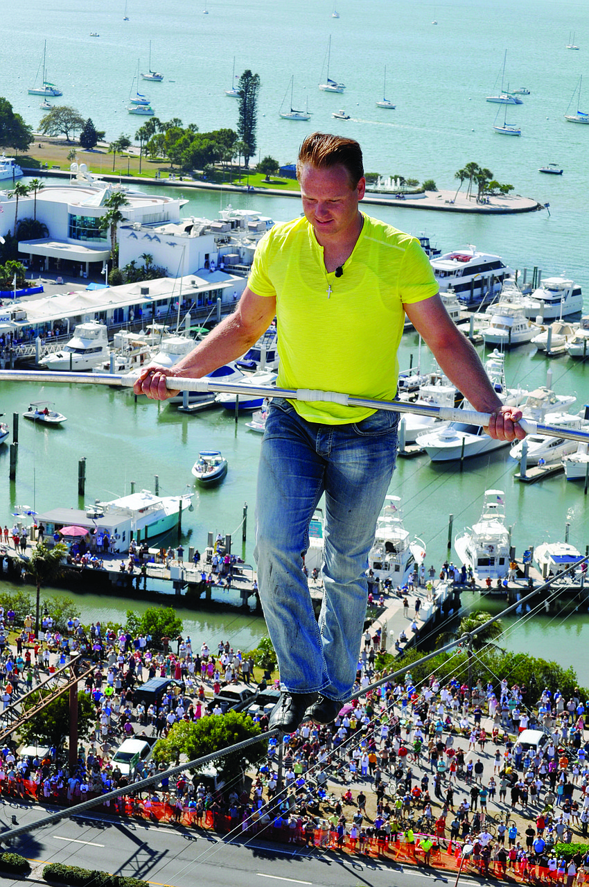 Nik Wallenda successfully completes his high-wire walk across U.S. 41 Jan. 29. The walk took about 11 minutes to complete.
