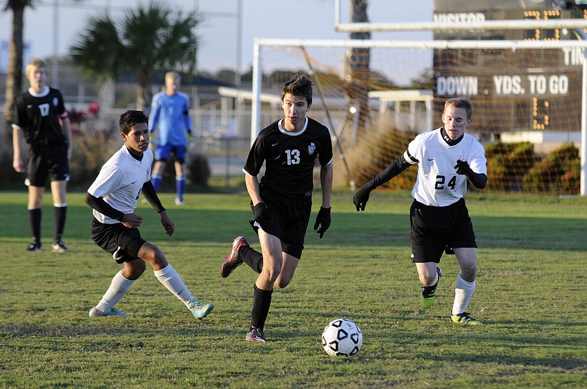 Braden River junior defender Alex Cook maneuvers the ball up the field during the Pirates 1-0 loss to rival Lakewood Ranch Jan. 7.