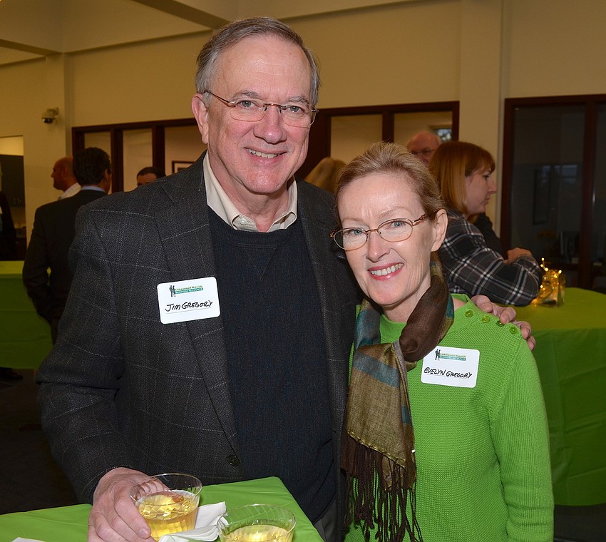 Jim and Evelyn Gregory enjoy drinks and a good time together.