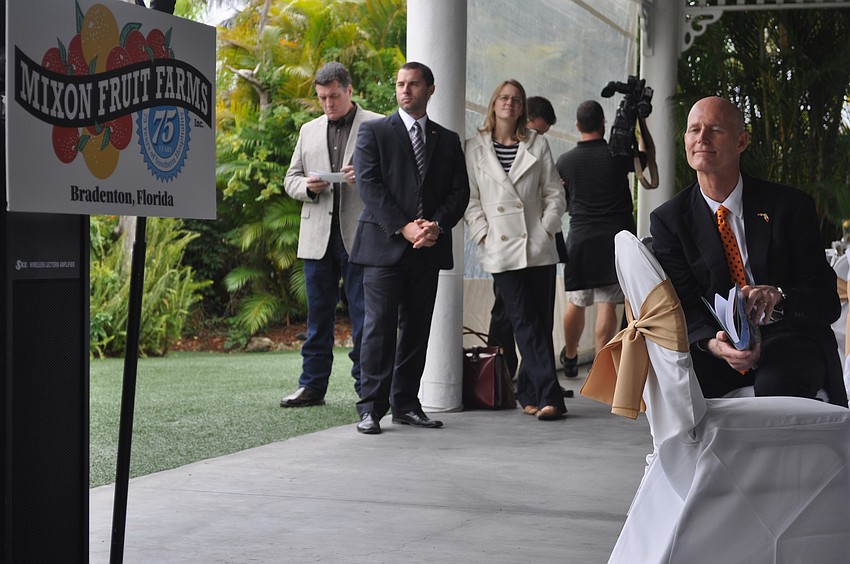 Gov. Rick Scott followed along to the Mixonâ€™s presentation.