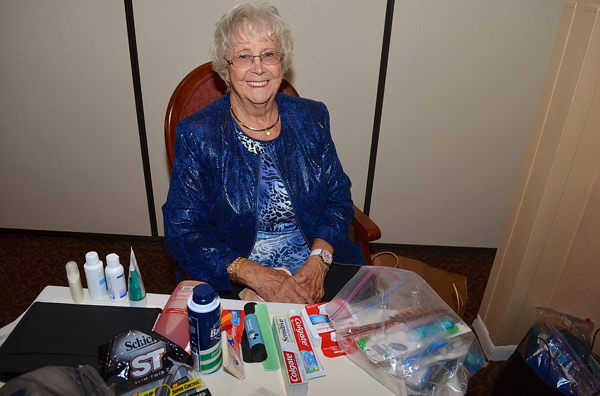 Charity Chairwoman Shirley Lane organizes health kits for the two charities of the month â€” Salvation Army and the Resurrection House.