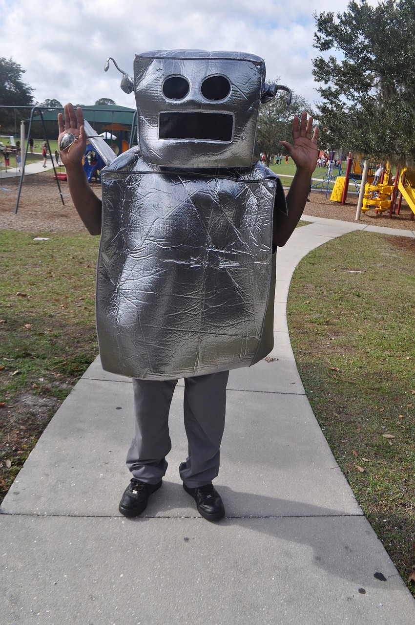 Summerfield's Chris Peoples entertained children as a dancing robot.