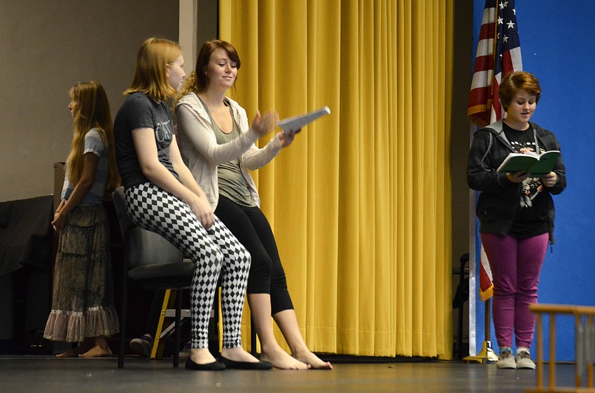 Sumaya Ayad (Princess Tigerlilly) waits backstage while Bailey Macejak (Peter Pan) Gretchen Beaumier (Wendy) and Amanda Gerulski (narrator) read a scene.