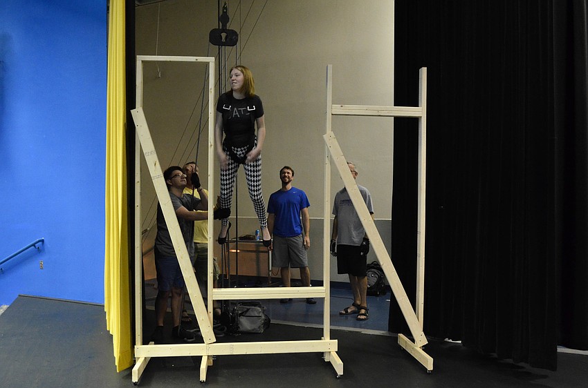 Bailey Macejak (Peter Pan) flies through the set window for a scene