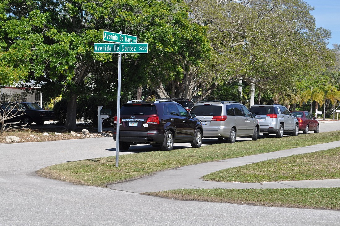 Avenida de Mayo has become a site for overflow parking from Siesta Key Village and the public beach.