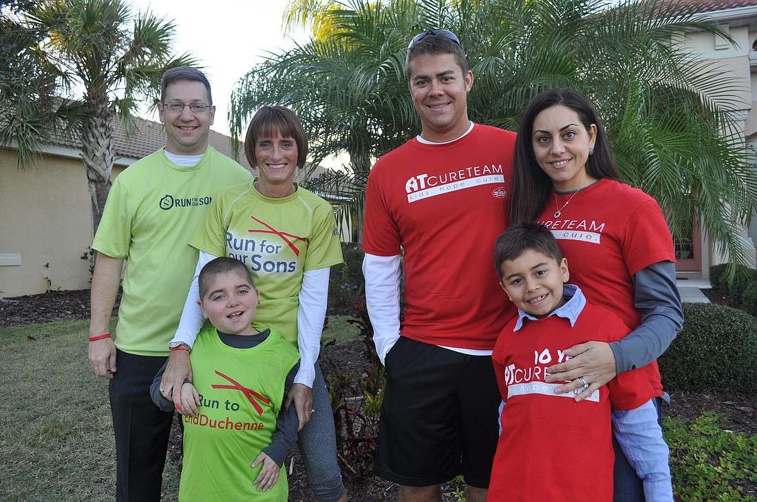 Josh Siegel Nick and Jen Tullio, with their son, Grayson, and Nick and Samantha Dzembo, with their son, Connor, use running as a way to raise funds for research on the disorders from which their children suffer.
