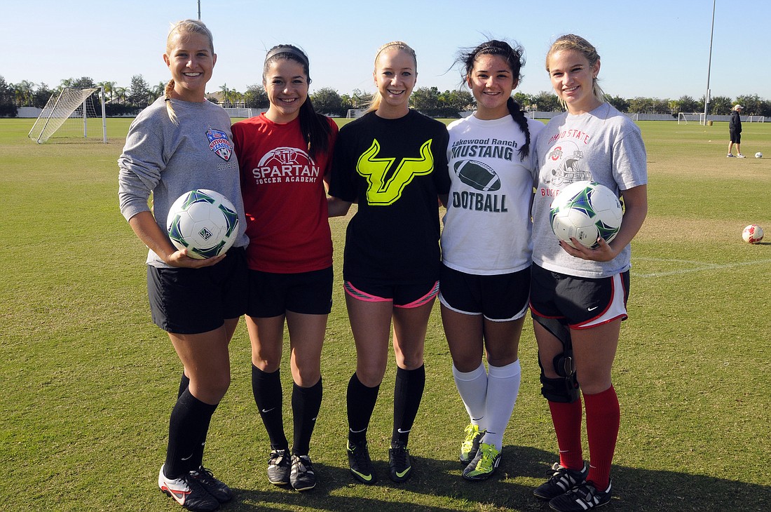 Photos by Jen Blanco. Lakewood Ranch High seniors Alex Latham, Lindsay Martinez, Delaney Riggins, Gabby Photos and Bri Reda have been playing soccer together since they were in elementary school. (Not pictured is Juliana Guida.)