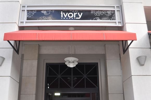 Club Ivory owner Ambrish Piare says he has spent nearly $85,000 on sound proofing to accommodate residents of the Plaza at Five Points.