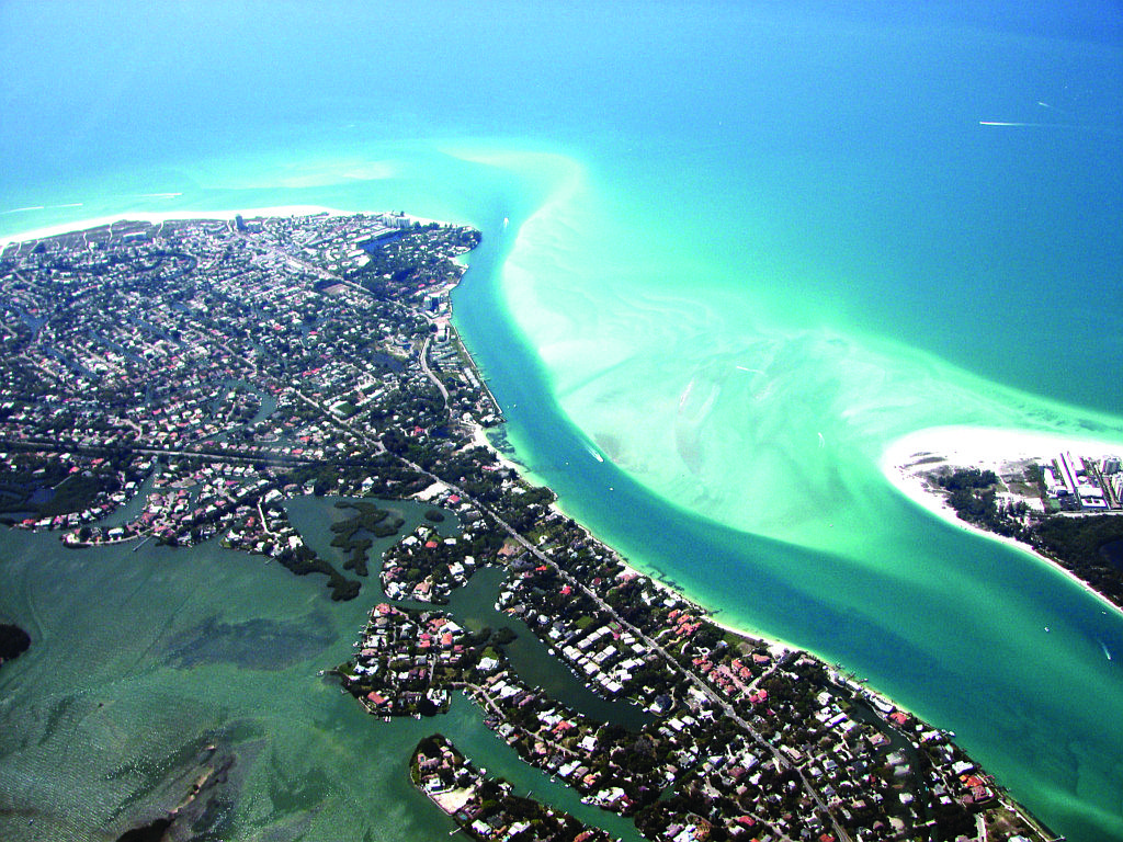 File photo Sarasota's Big Pass, seen here in an aerial photo, has never been dredged.
