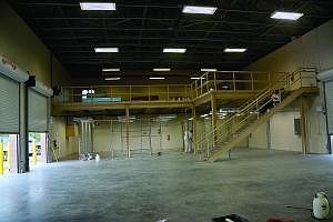 The 8,000-square-foot facility includes a covered bay area.