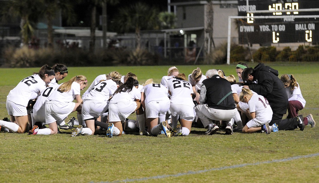 The Lakewood Ranch High girls soccer team huddles together before the start of its Class 4A-District 11 semifinal match versus North Port Jan. 15.