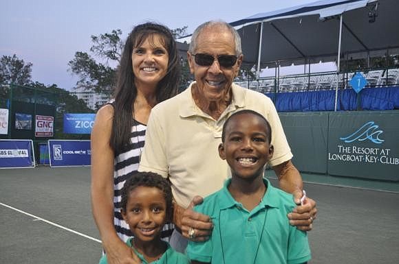 Cindi and Nick Bollettieri with their sons, Giacomo, 5, and Giovanni, 8 at last year's Sarasota Open.
