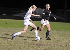 Lakewood Ranch High freshman Sophia Falco, left, scored a pair of goals for the Lady Mustangs.