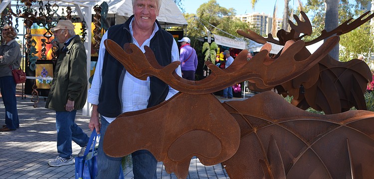 John Kortecamp with Frederick Prescottâ€™s â€œMoose on the Looseâ€.