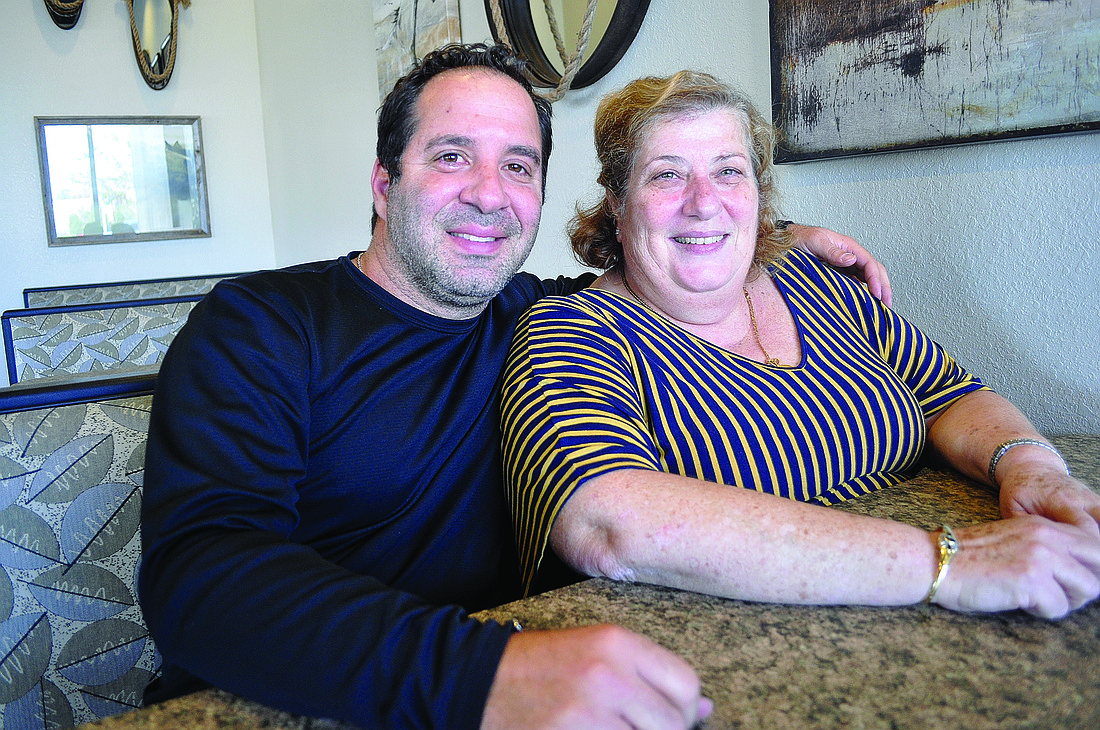 Josh Siegel Andy Ameres, with his mother, Popi, will run the family's Lakewood Ranch location, which has a unique, rustic feel but the same family-oriented atmosphere.