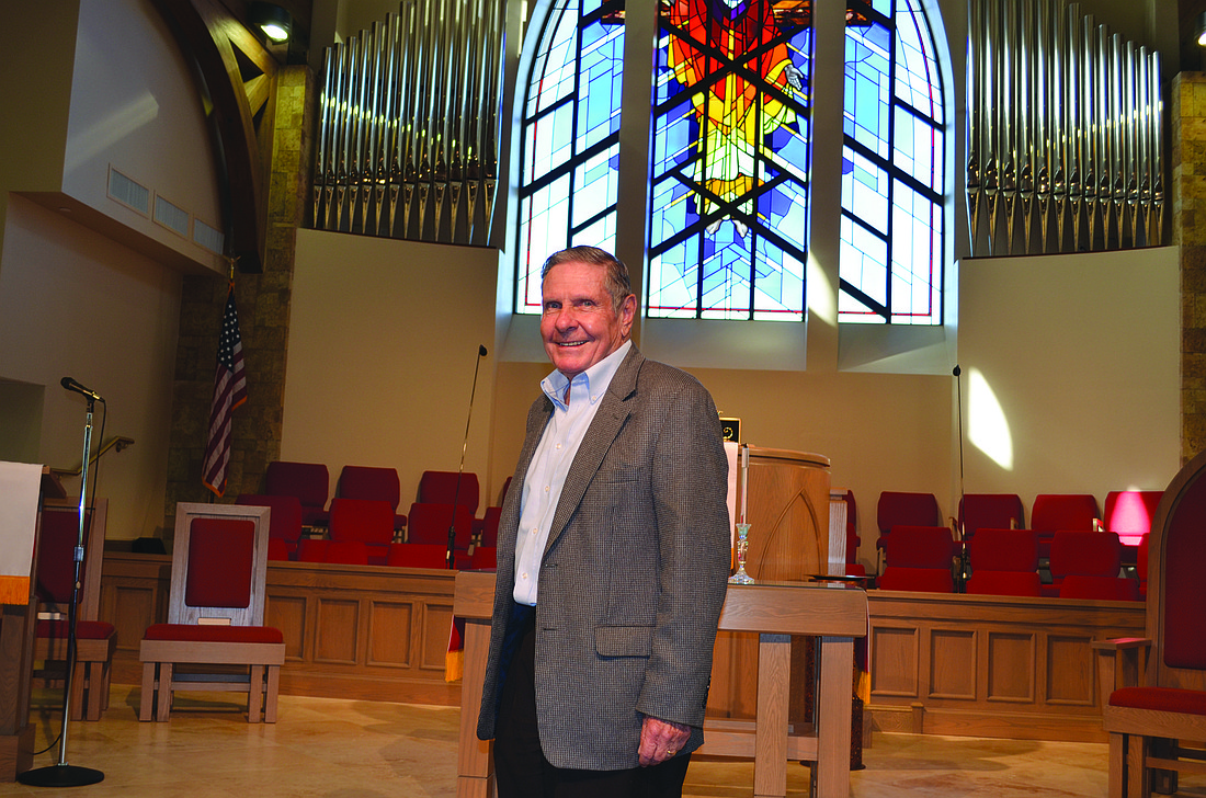Robin Hartill The Rev. Bruce Porter stands in the sanctuary of Christ Church of Longboat Key, Presbyterian, which was completed in 2011.