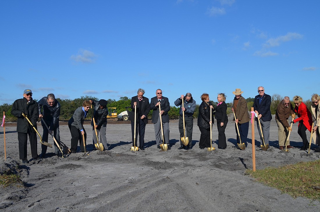 School Board members, County Commissioners, City Commissioners and SMA Board of Directors used gold shovels for the groundbreaking.