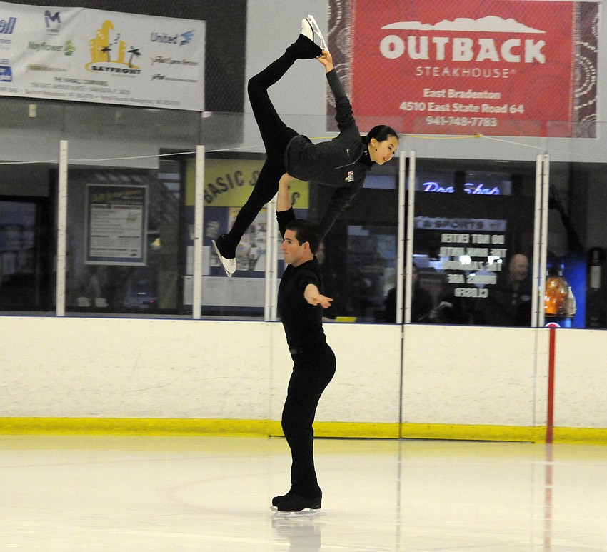 U.S. figure skaters Felicia Zhang and Nathan Bartholomay perform an element of their program during a training session Jan. 22.
