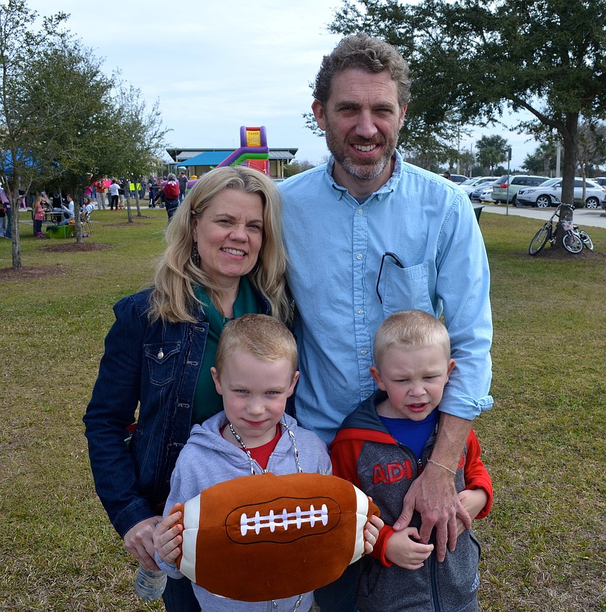 The Doney family â€” Erin, John, Gabriel, 9, and Lukas, 7.