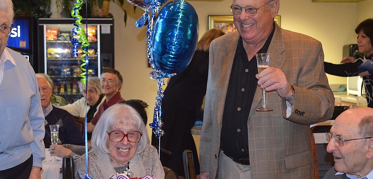 Charlotte Zwick's nephew, Richard Matson, gives a toast.