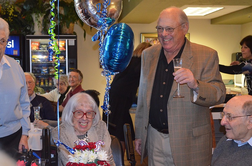 Charlotte Zwick's nephew, Richard Matson, gives a toast.