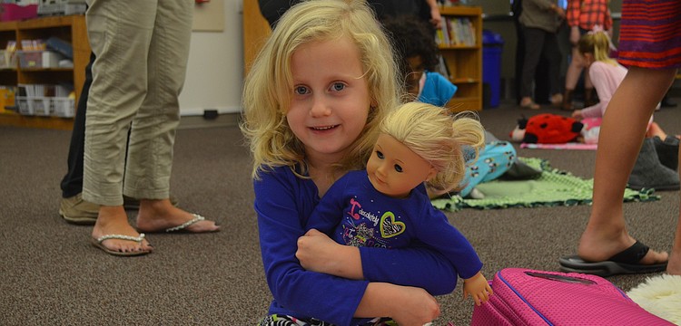 Anna Buchmeier, 6, and Julia attend their first storybook night.