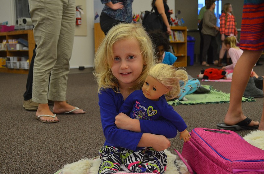 Anna Buchmeier, 6, and Julia attend their first storybook night.
