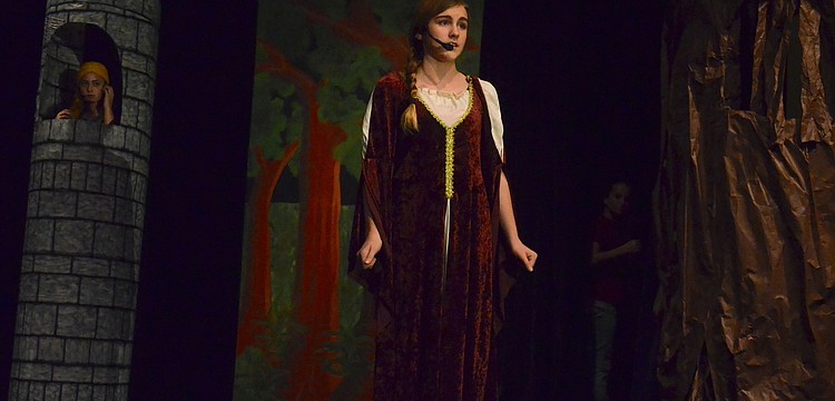 Rachael Davis narrates the fairy tale compilation during a dress rehearsal Jan. 29.