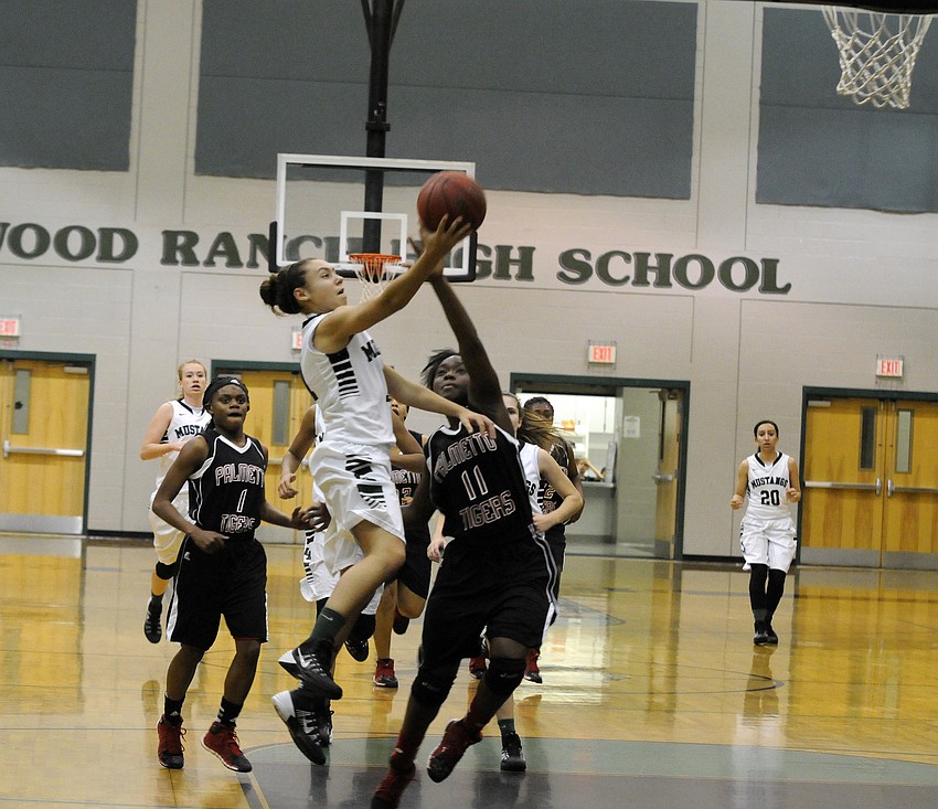 Lakewood Ranch shooting guard Emily Bulfin goes up for a shot in the second quarter of the Lady Mustangs 76-51 victory over Palmetto in the Class 7A-District 10 semifinals Jan. 29.