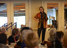 Lynn Hayes poses before walking down the runway.