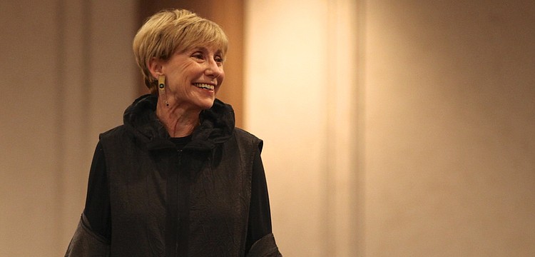 Susan Morin smiles as she models a layered look.