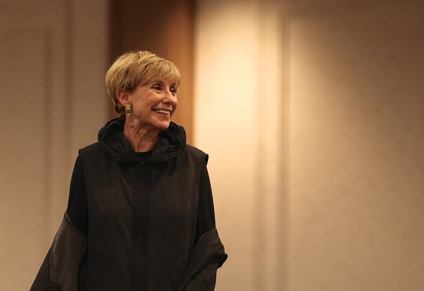 Susan Morin smiles as she models a layered look.