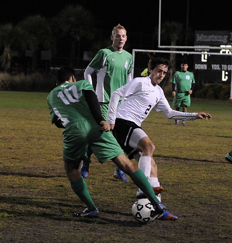 Jen Blanco Lakewood Ranch sophomore midfielder Felipe Dangond battles a Fort Myers defender for possession in the first half.