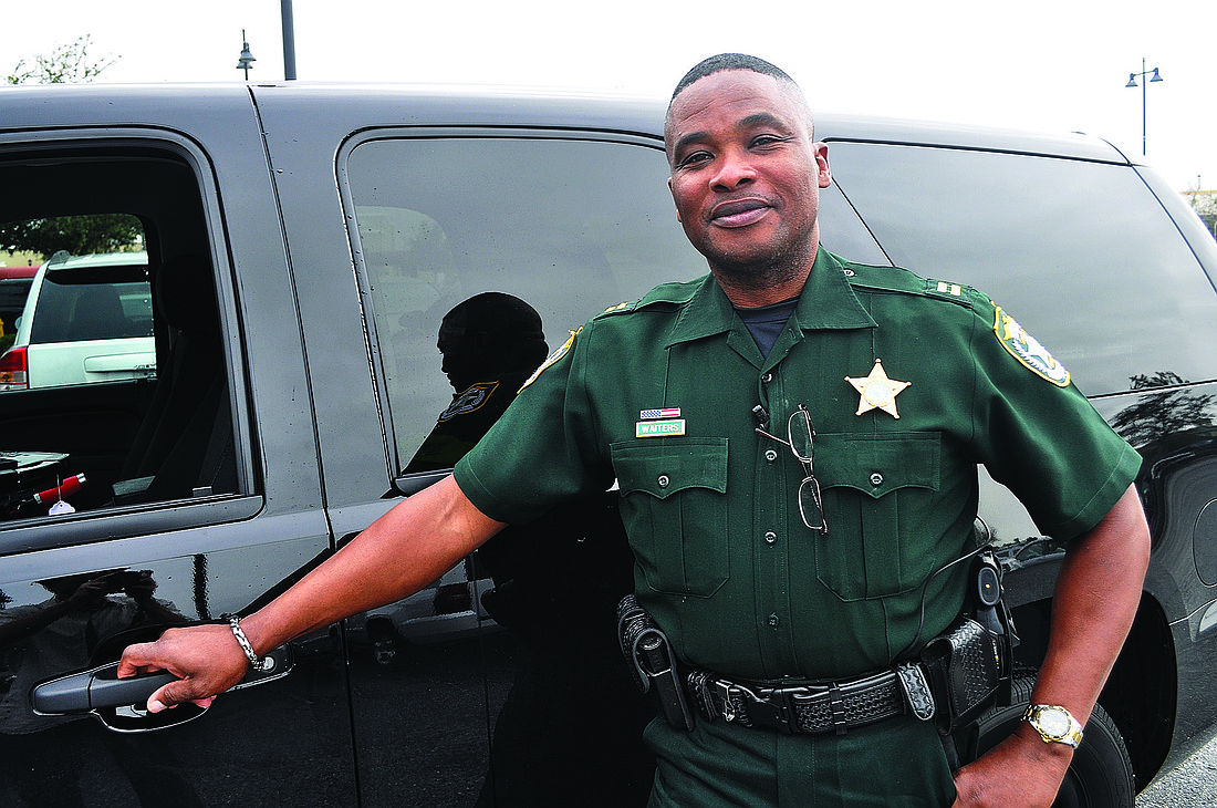 Capt. Lorenzo Waiters, like all sheriff's office captains, drives an unmarked vehicle, which still has sirens. Photo by Josh Siegel.