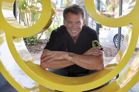 Tube Dude owner Scott Gerber has agreed to repay $56,000 to Sarasota County to reimburse part of an economic incentive agreement.