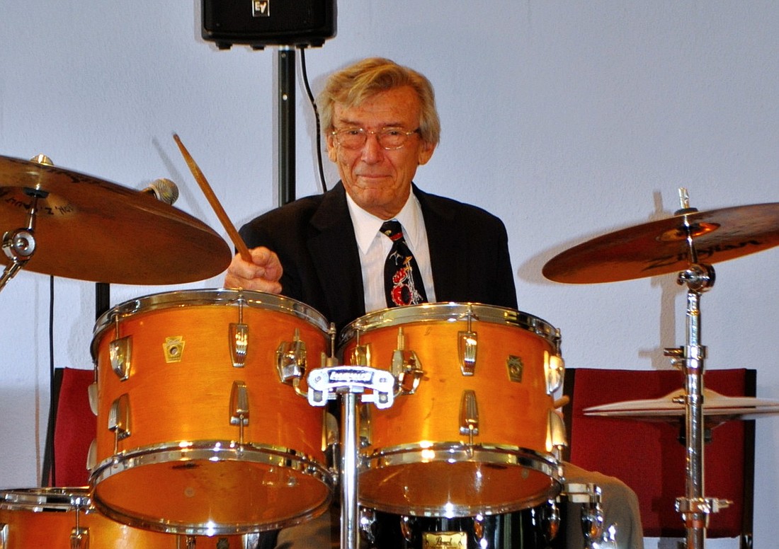 Al Hixon plays the drums at last year's service.