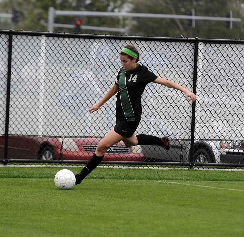 Lakewood Ranch senior defender Juliana Guida sends the ball back up to the midfield.