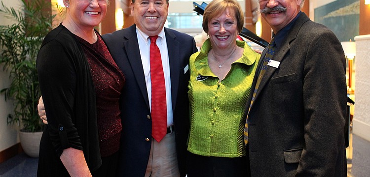 Juli and Paul Kampe with Linda and Mounif Seamaan