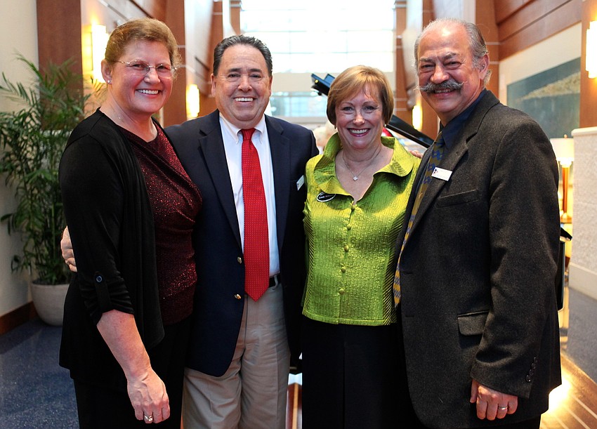 Juli and Paul Kampe with Linda and Mounif Seamaan