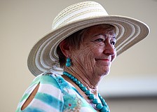 Eleanor McConnell shows off a hat and turquoise jewelry.