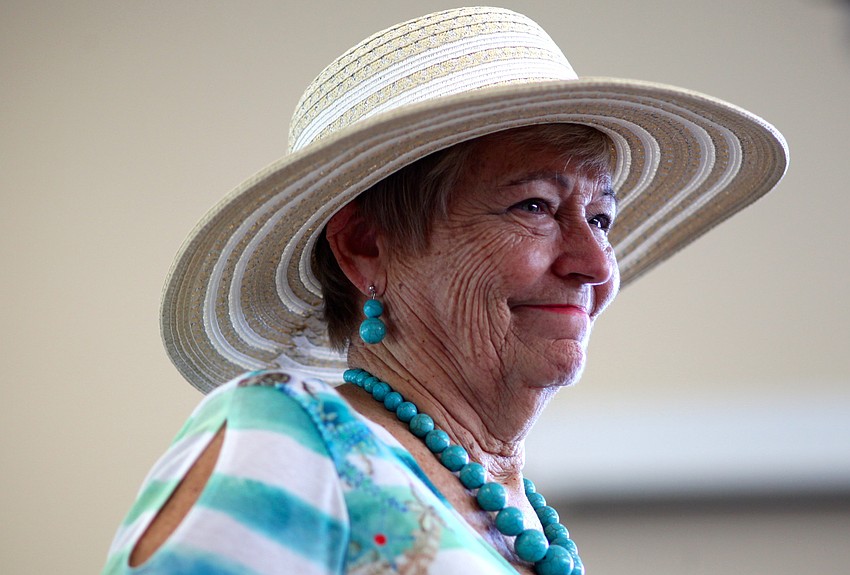 Eleanor McConnell shows off a hat and turquoise jewelry.