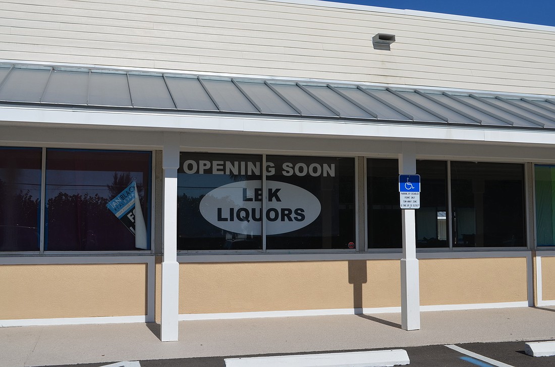 A sign that advertises LBK Liquors went up in the past week. (Kurt Schultheis)