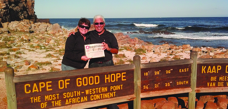 GOOD NEWS. Lakewood Ranch Golf and Country Club residents Fran and Thom Mastrelli brought their East County Observer along on their recent tour through South Africa. They caught up on their news at the Cape of Good Hope near Capetown.