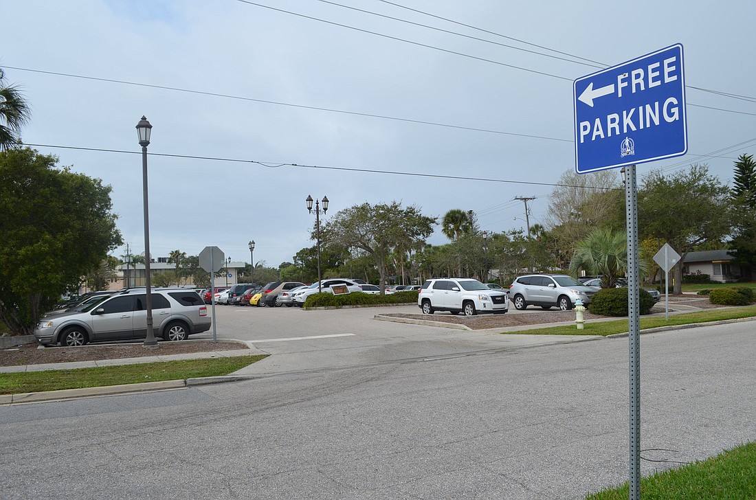 David Conway A parking lot on North Adams Drive is one possible site for a parking structure on St. Armands, but residents are concerned about the design elements of any garage.