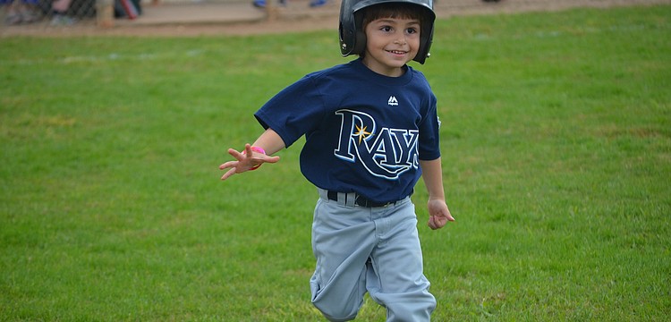 Dominic Mattera, 4, runs to first base.