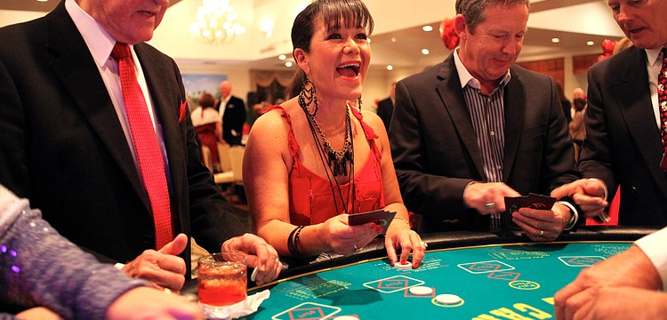 Sandra Ceshker smiles after a particularly good hand in Black Jack.
