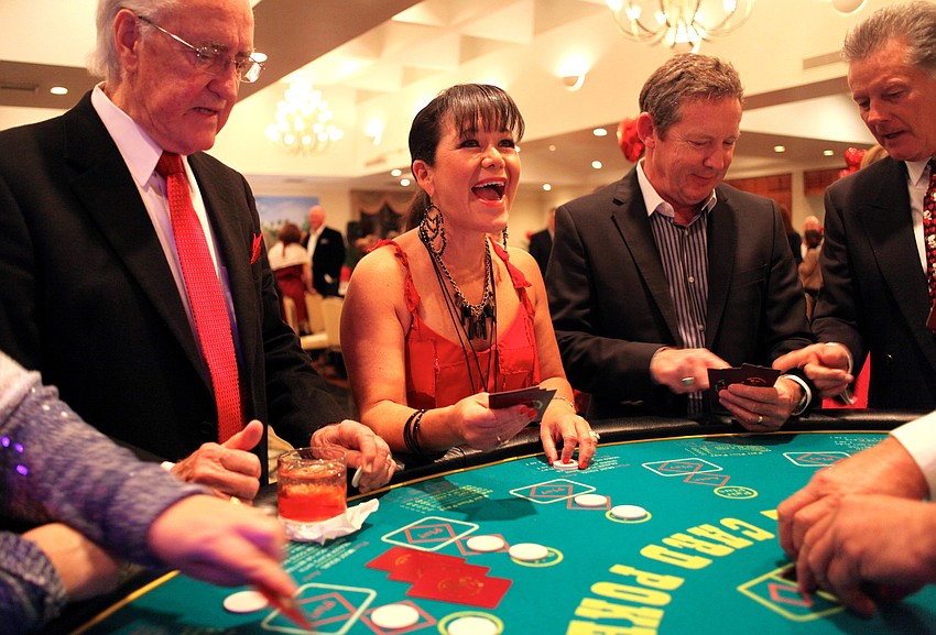 Sandra Ceshker smiles after a particularly good hand in Black Jack.