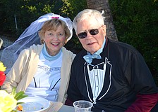 Sharon and Pete Meyer enjoy snacks with friends.